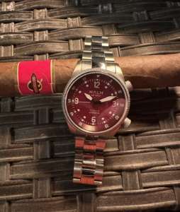 MALM watch and cigar